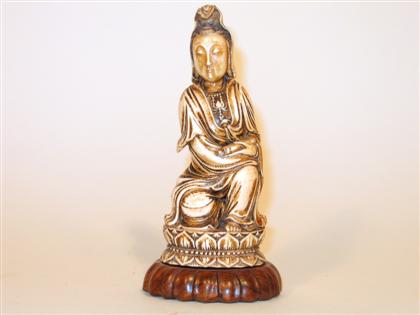 Appraisal: Chinese elephant ivory Quanyin model Well carved seated model serene