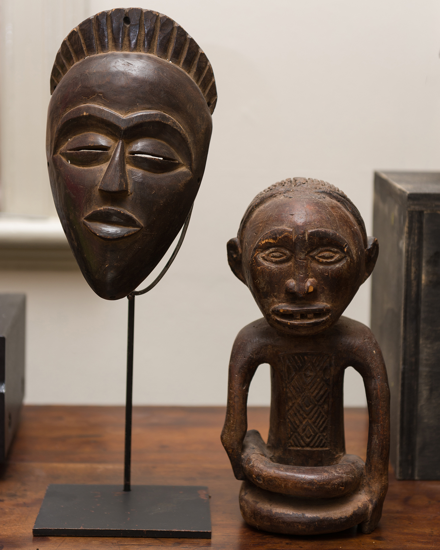 Appraisal: A CARVED TRIBAL MASK AND FIGURE FROM THE DEMOCRATIC REPUBLIC