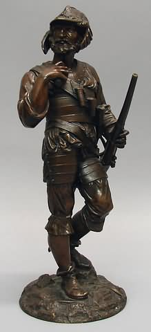 Appraisal: Standing helmeted figure with ammo belt across chest gun in