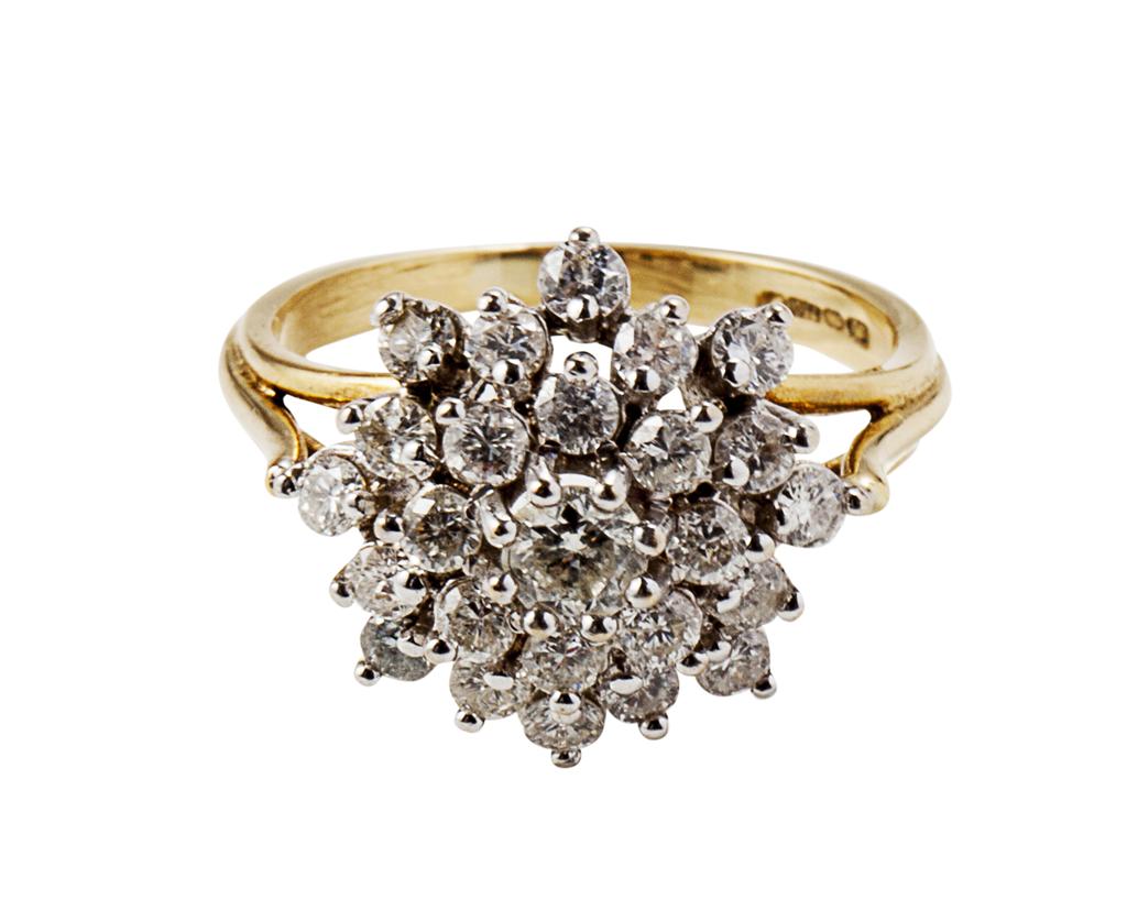 Appraisal: A diamond set cluster ring claw set with round cut