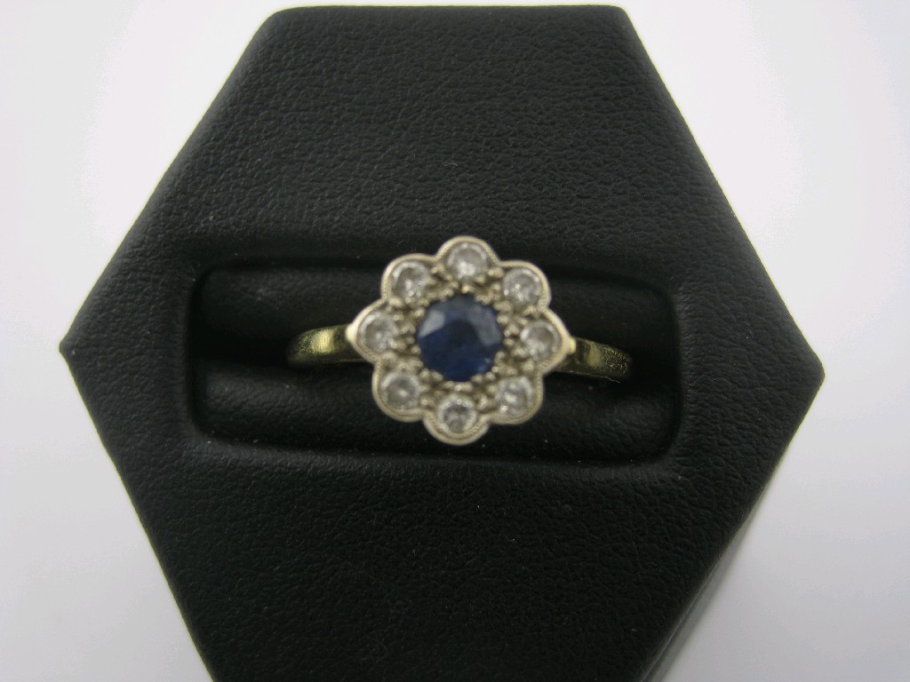 Appraisal: A Sapphire and Diamond Cluster Ring pav -set central circular-cut