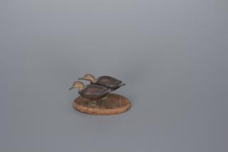 Appraisal: Miniature Black Ducks Wendell Gilley Miniature Black Ducks Wendell Gilley