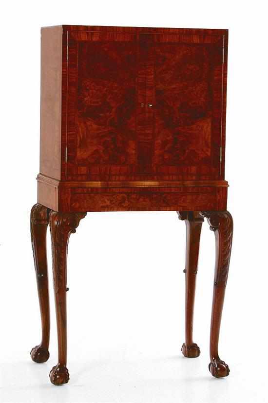 Appraisal: Chippendale style burl walnut drinks cabinet th century two cupboard