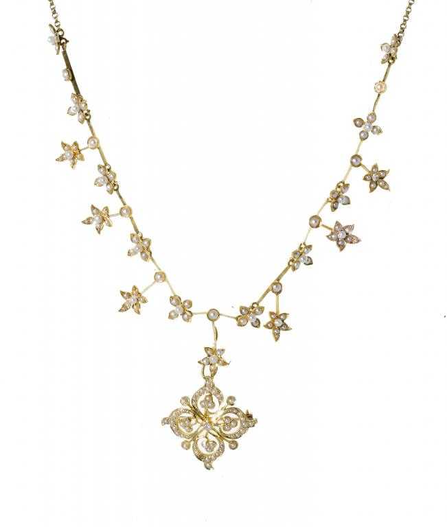 Appraisal: A DIAMOND SPLIT PEARL AND GOLD NECKLACE with demountable openwork