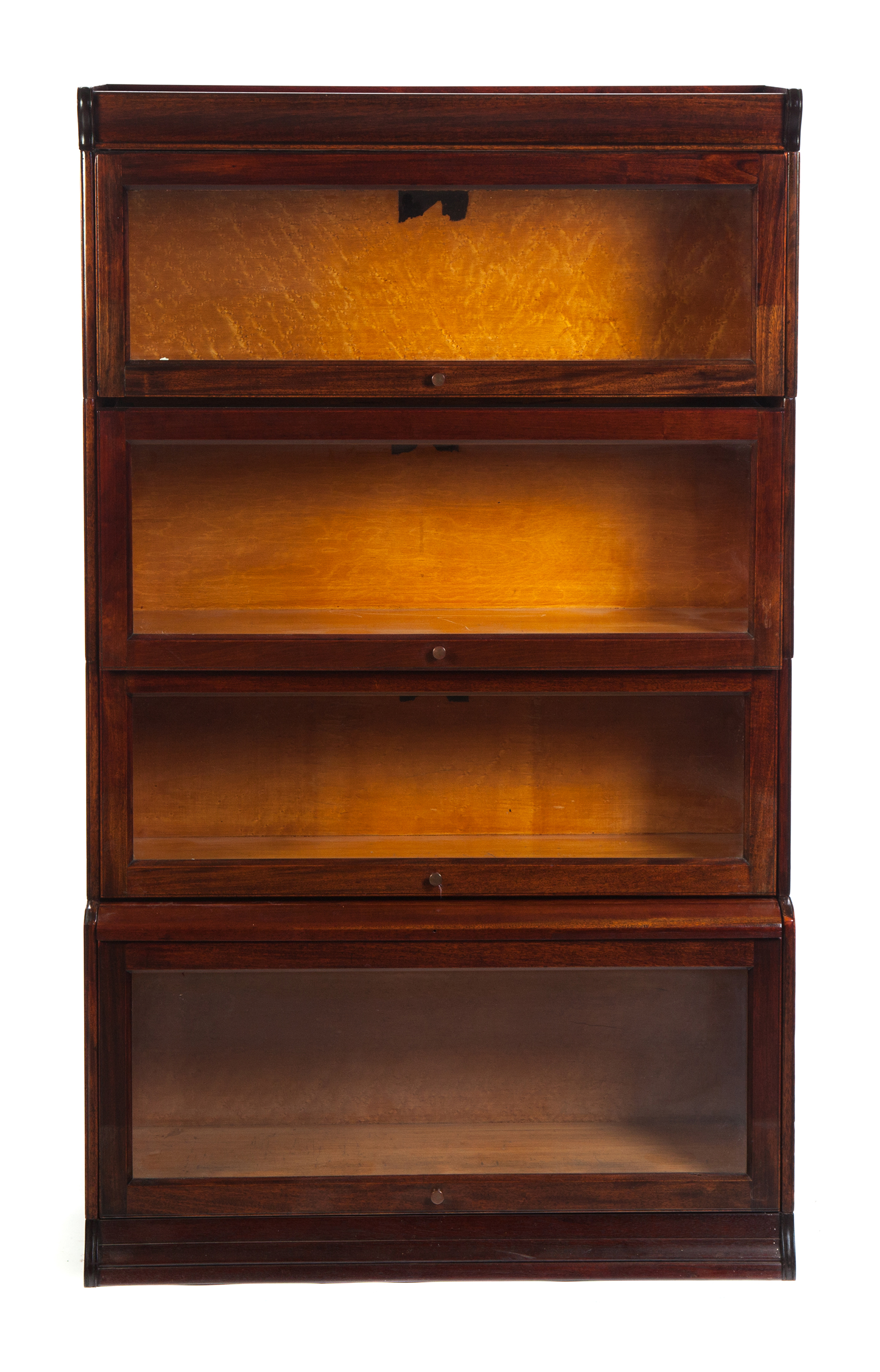 Appraisal: FOUR-SECTION STACKING BOOKCASE American st quarter- th century mahogany Cap