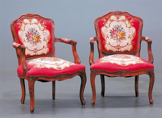 Appraisal: Pair Louis XV style fruitwood fauteuils cartouche-form needlework upholstered back