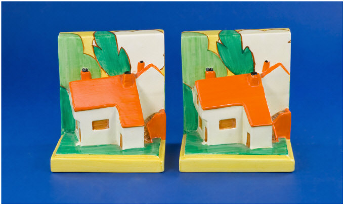 Appraisal: Pair of Clarice Cliff Bookends s Orange roofed cottage on