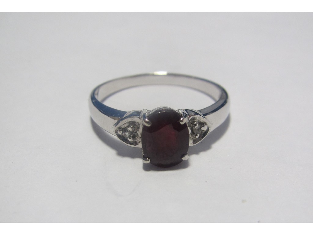 Appraisal: White gold ruby set ring with central oval cut ruby