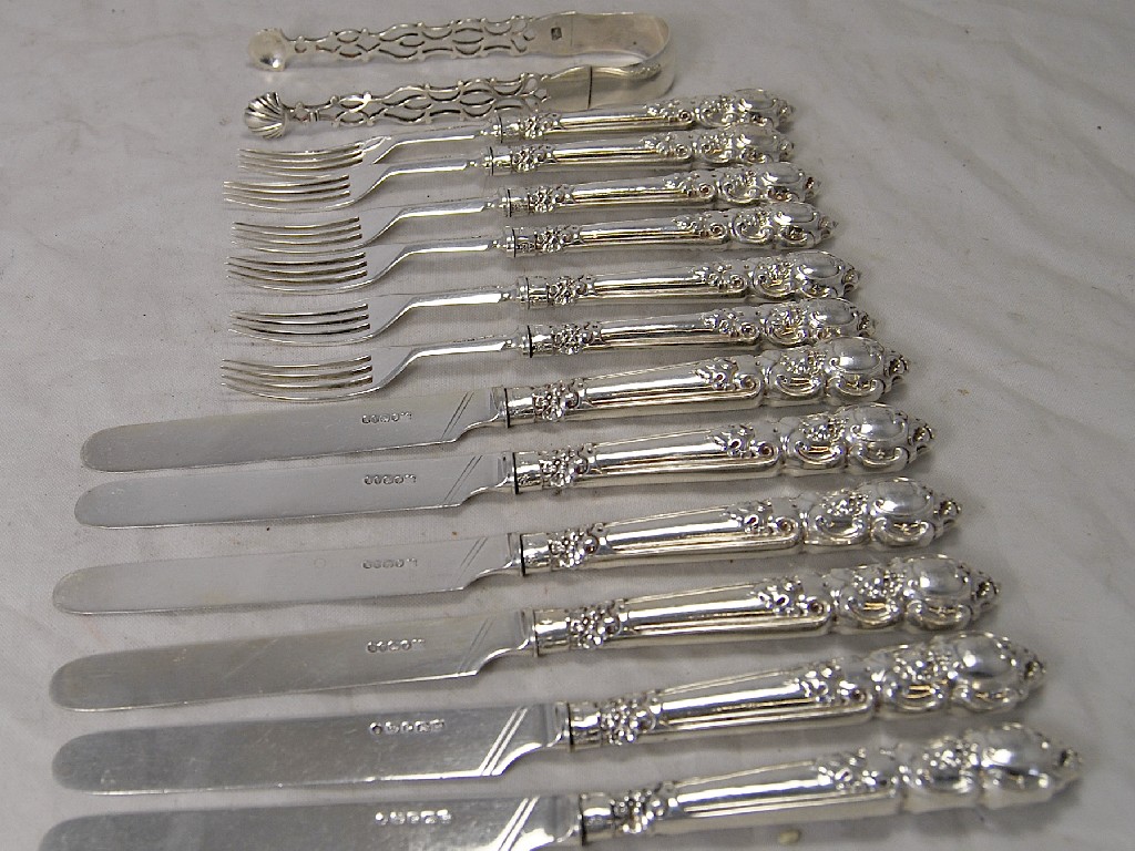 Appraisal: A set of Victorian dessert knives and forks with silver