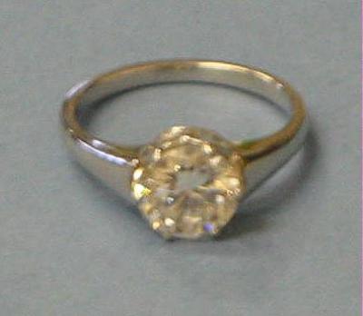 Appraisal: A SOLITAIRE DIAMOND RING the brilliant cut stone approximately cts