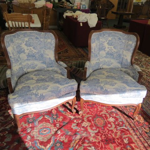 Appraisal: Pair of French Carved Arm Chairs fine blue material with