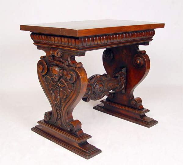 Appraisal: ITALIAN RENAISSANCE CARVED WALNUT SIDE TABLE Deeply carved masqueron and