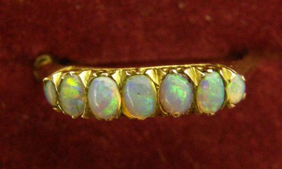 Appraisal: Opal seven stone claw set ring with hallmarked ct gold