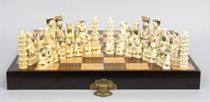 Appraisal: Chinese Carved Ivory and Bone Chess Set circa early th