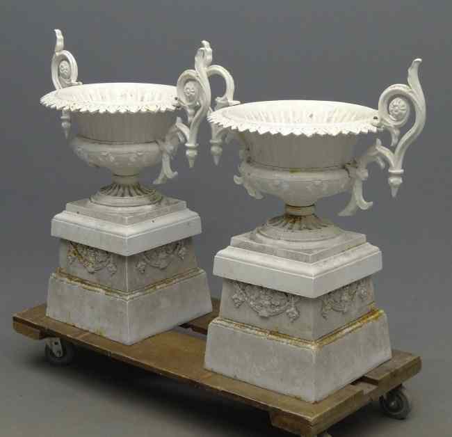 Appraisal: Pair cast iron multi-part urns '' Ht