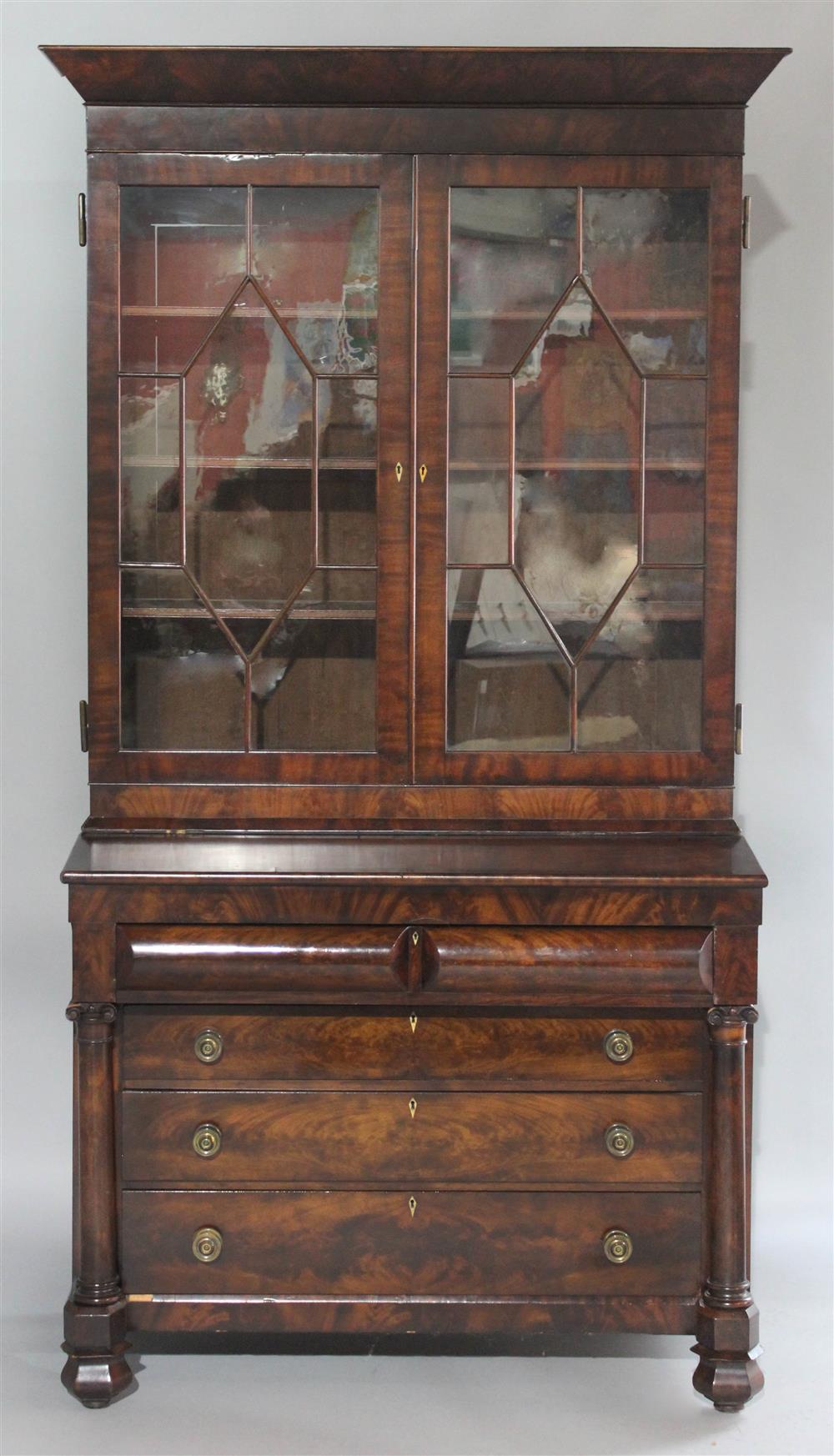 Appraisal: AMERICAN CLASSICAL MAHOGANY SECRETARY BOOKCASE in two parts the upper