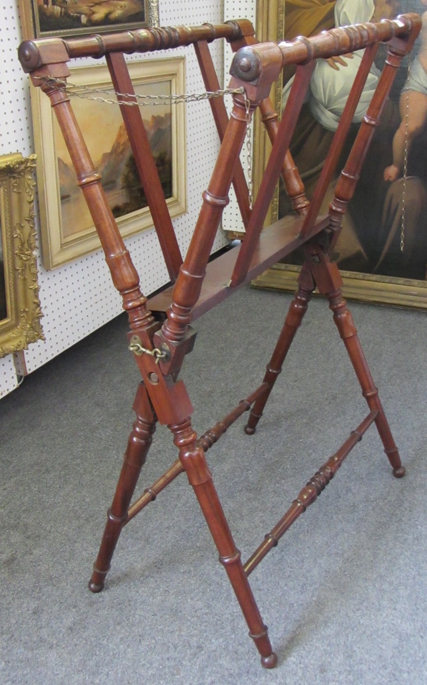 Appraisal: A George IV mahogany folio stand of folding 'X' frame