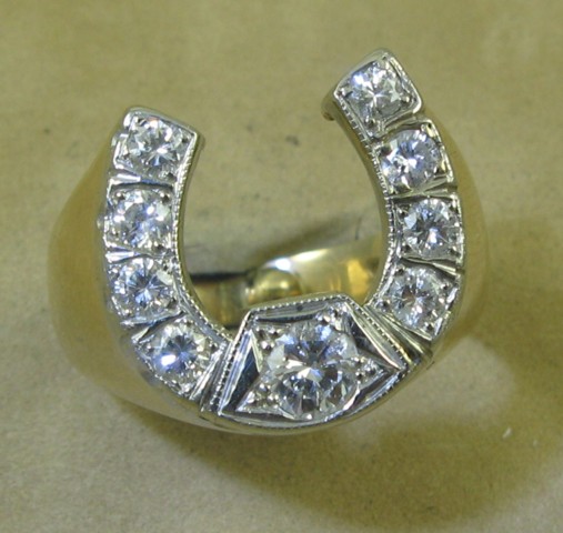 Appraisal: MAN'S DIAMOND AND FOURTEEN KARAT GOLD HORSESHOE RING the horseshoe