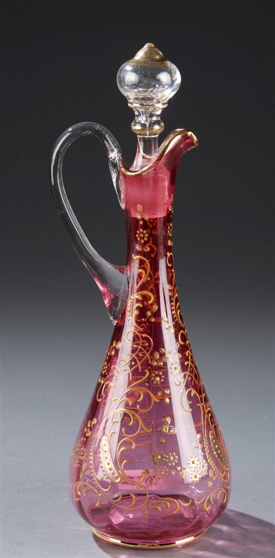 Appraisal: Cranberry glass cruet with clear glass stopper and handle th