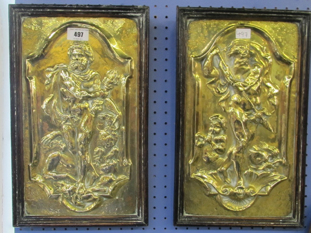 Appraisal: Pair of brass repousse plaques in wooden frames