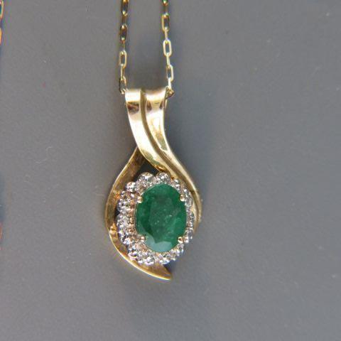 Appraisal: Emerald Diamond Pendant carat oval gem surrounded by diamonds in