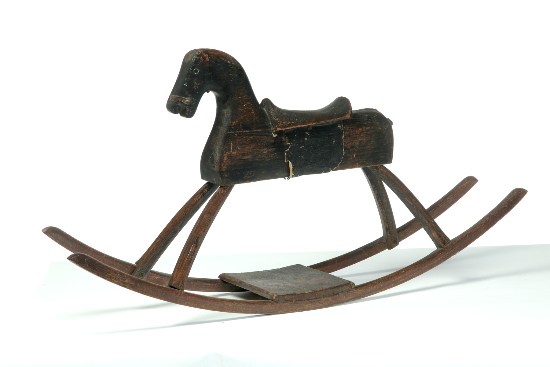 Appraisal: ROCKING HORSE American late th century Primitive wooden horse with