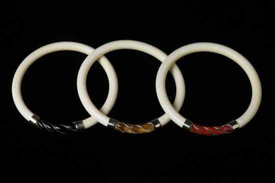 Appraisal: THREE IVORY BANGLES - in diam