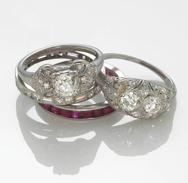 Appraisal: A collection of four diamond and ruby rings comprising two