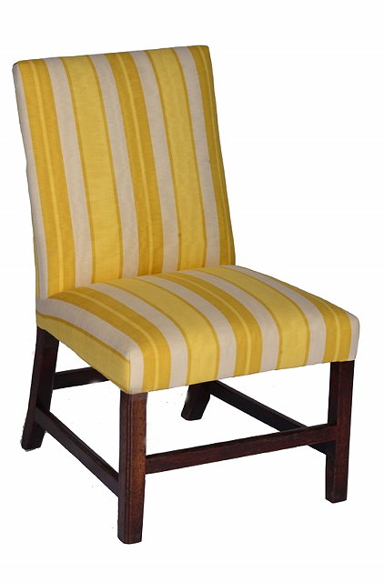 Appraisal: A GEORGE III MAHOGANY FRAMED LIBRARY CHAIR with yellow and