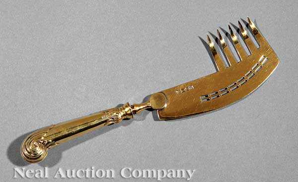 Appraisal: An English Edwardian Sterling Silver Gilt Cake Knife or Fish