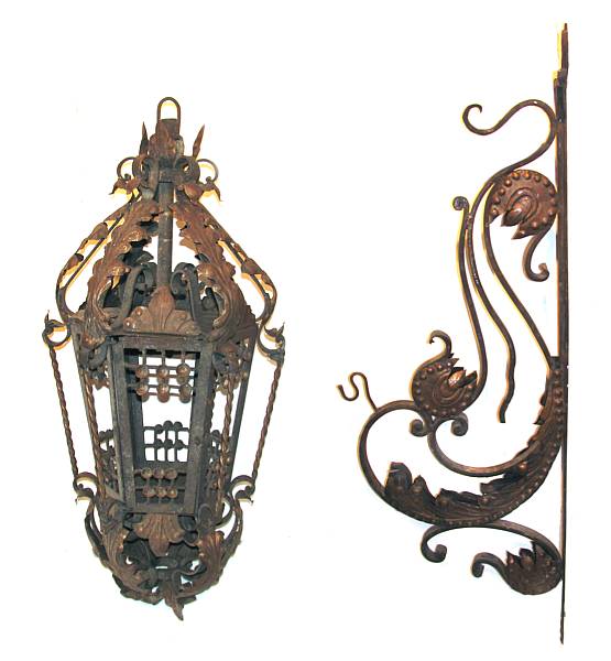 Appraisal: A pair of wrought iron lanterns with brackets height ft