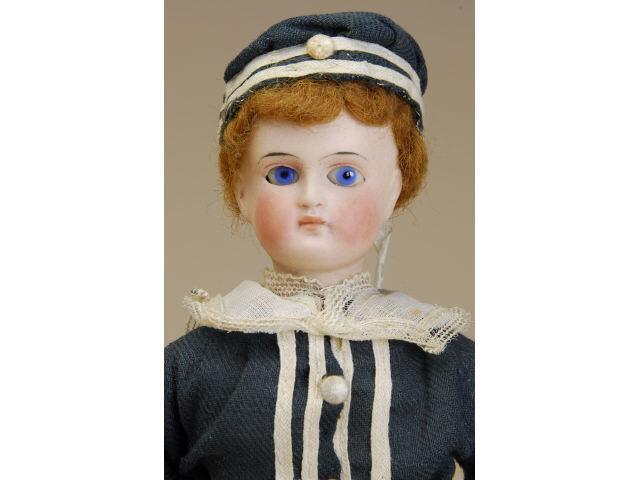 Appraisal: All Original Belton Boy Germany ca pale bisque flange head