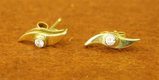 Appraisal: Pair of leaf style earrings set with a single round