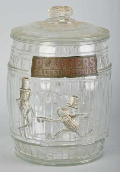 Appraisal: Embossed Planters Peanuts Barrel Store Jar Description Nice early jar