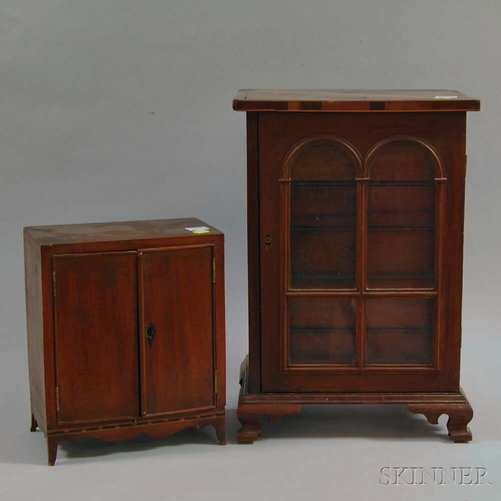 Appraisal: Two Miniature Cabinets a miniature Federal-style inlaid mahogany wardrobe with