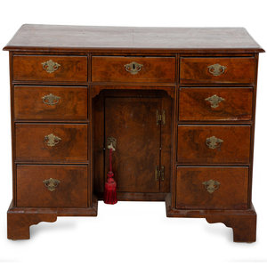 Appraisal: A George II Style Burl Walnut Kneehole Desk TH CENTURY