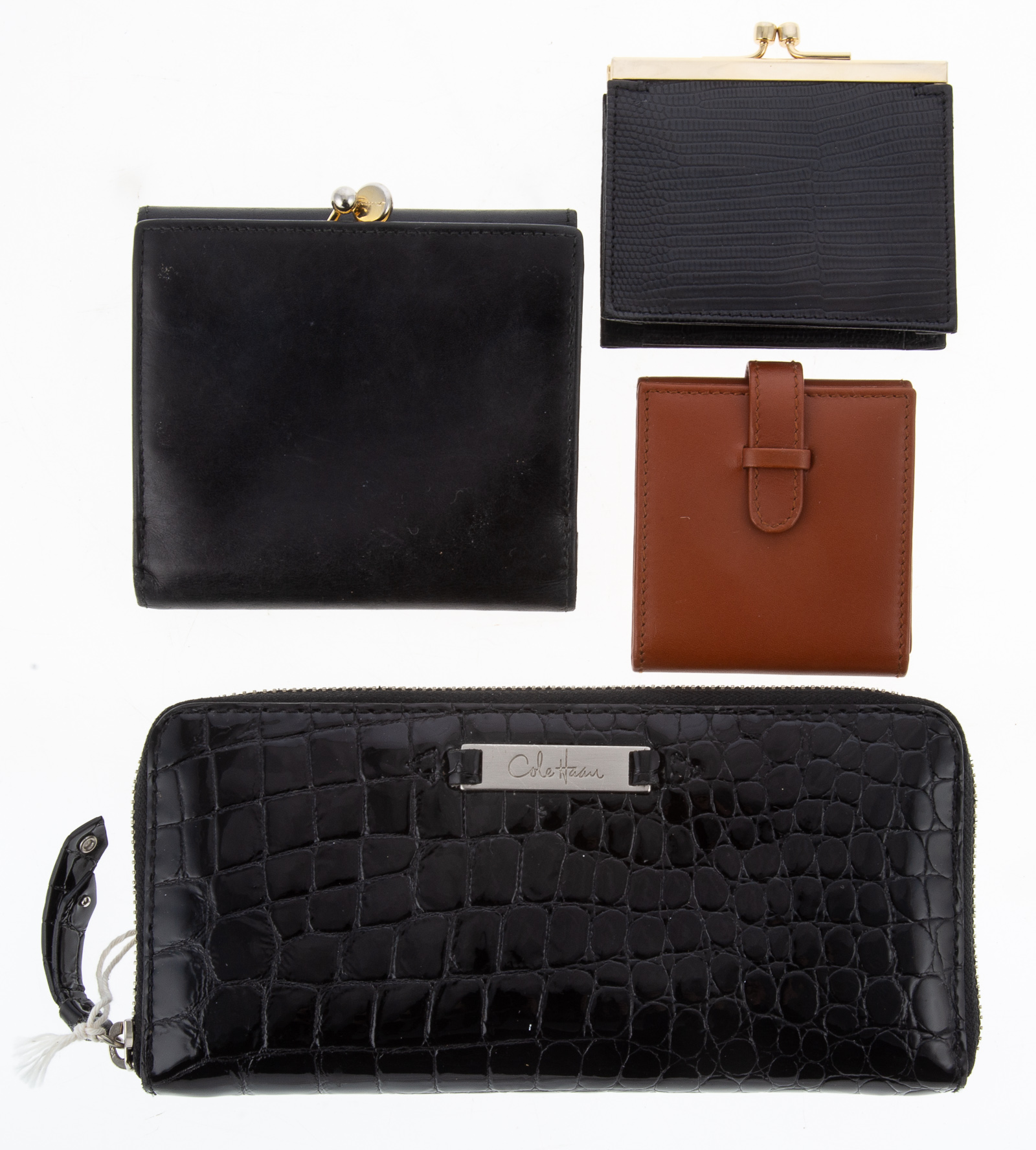 Appraisal: FOUR SMALL LEATHER ACCESSORIES including a Cole Haan patent leather