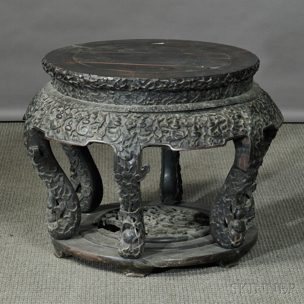 Appraisal: Black Lacquered Stand China elaborately carved hardwood ht dia in