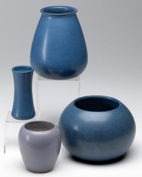 Appraisal: MARBLEHEAD Four vases in matte indigo or purple glaze All