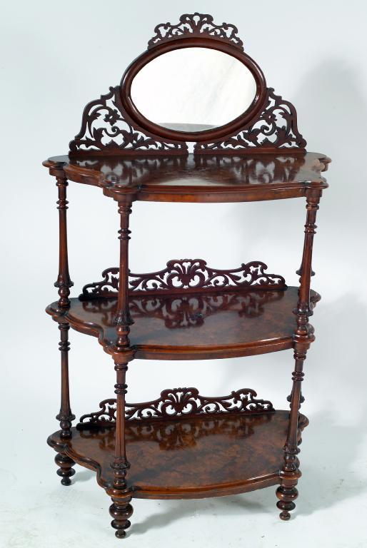 Appraisal: VICTORIAN WALNUT THREE-TIER WHAT-NOT c the quarter-veneered moulded graduated cartouche-shaped