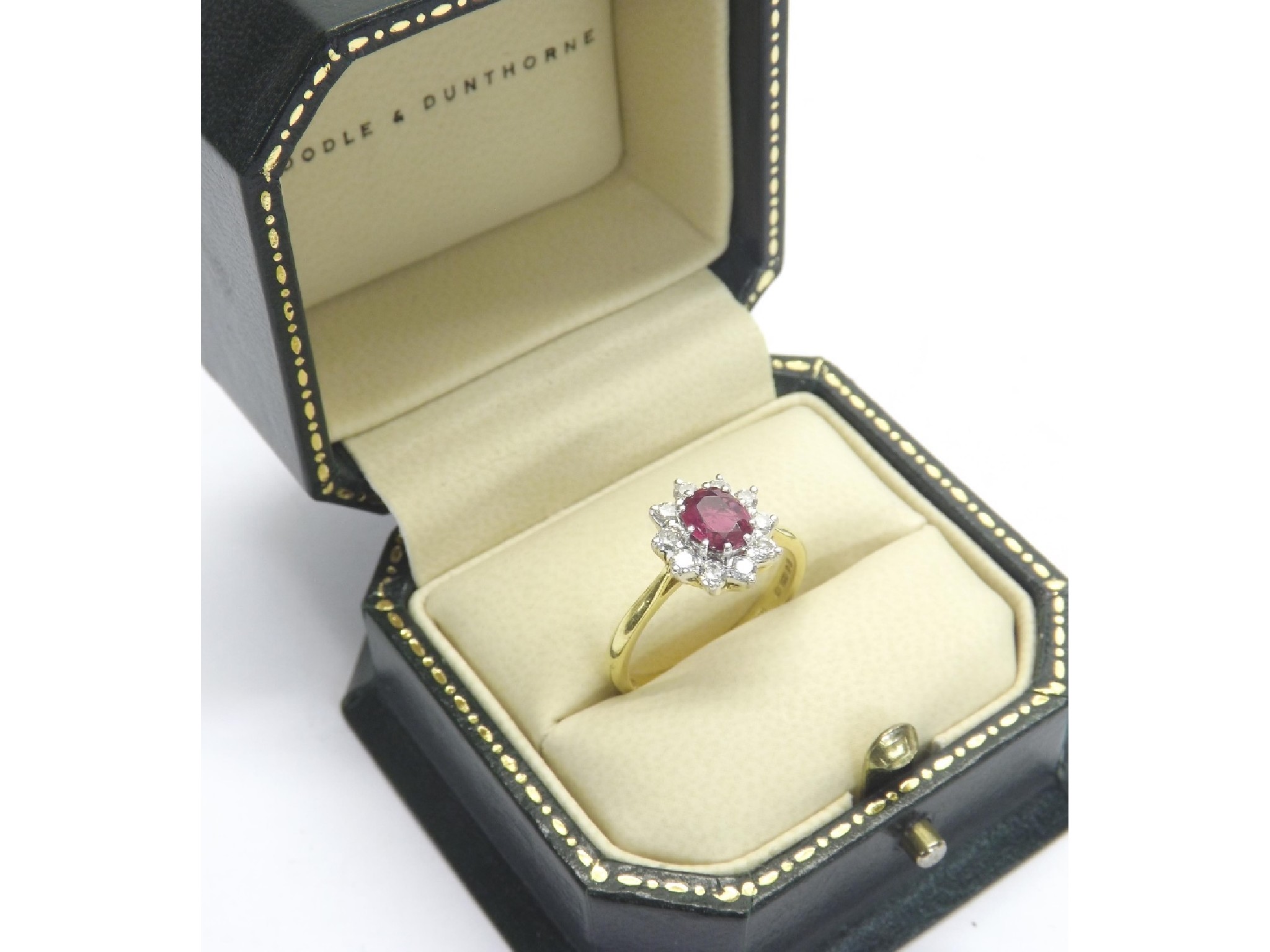 Appraisal: Boodles ct ruby and diamond cluster ring the central emerald