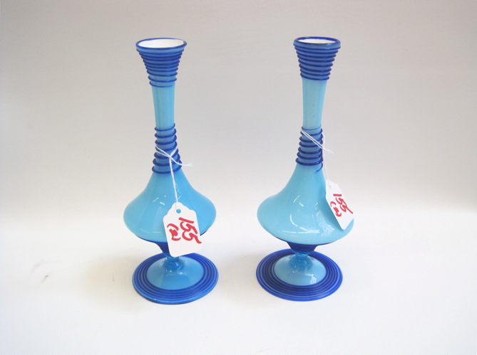 Appraisal: PAIR FRY FOVAL ART GLASS BUD VASES Pale blue fields