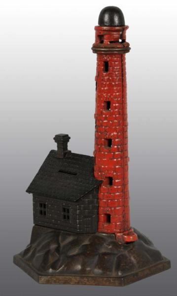 Appraisal: Cast Iron Lighthouse Mechanical Bank Description Working CORRECTION - HAS