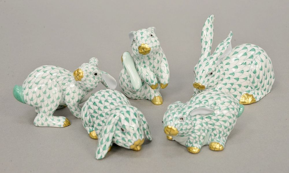 Appraisal: Group of five Herend porcelain rabbit figurines in green fishnet