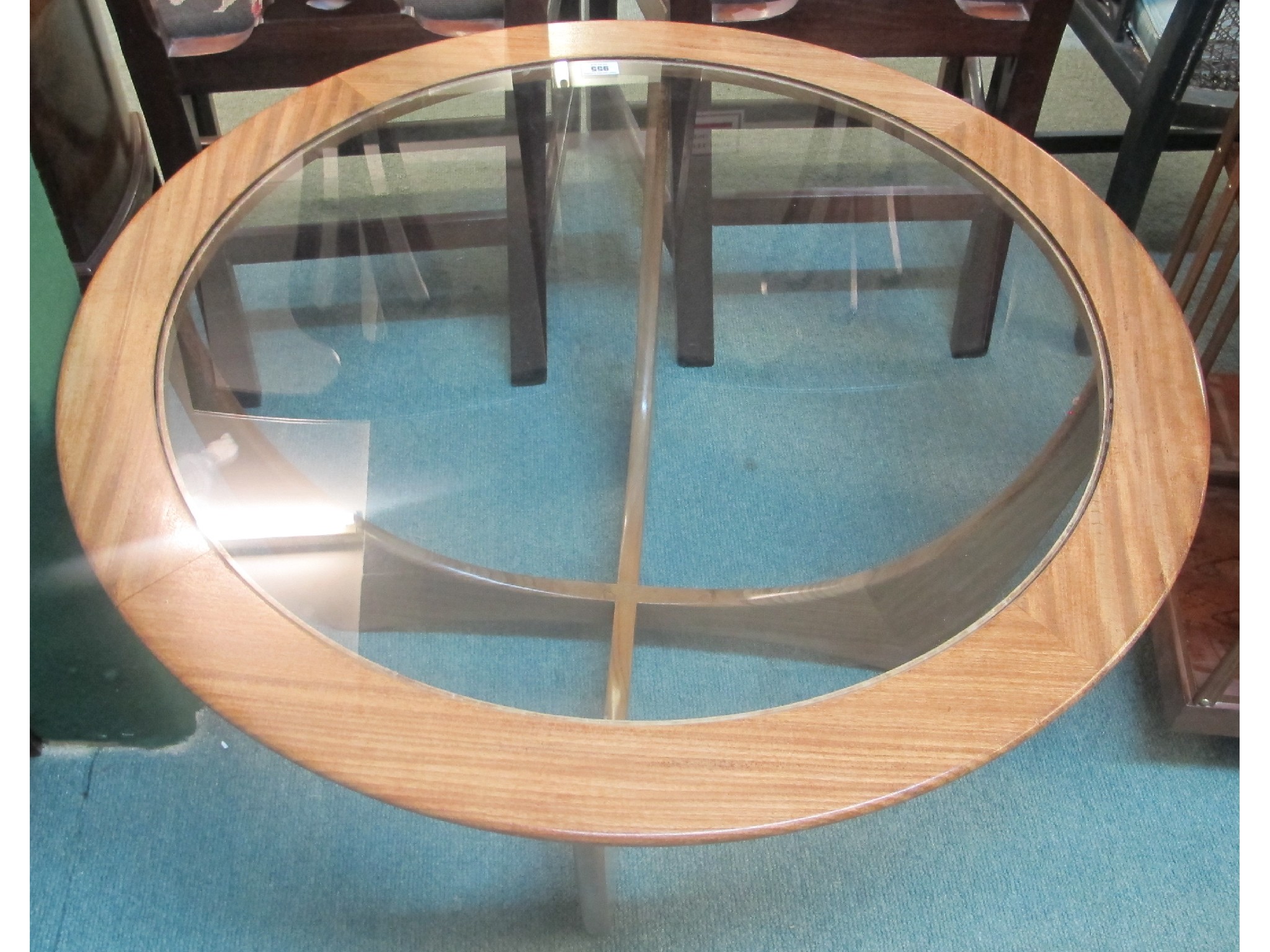 Appraisal: A retro style teak circular coffee table