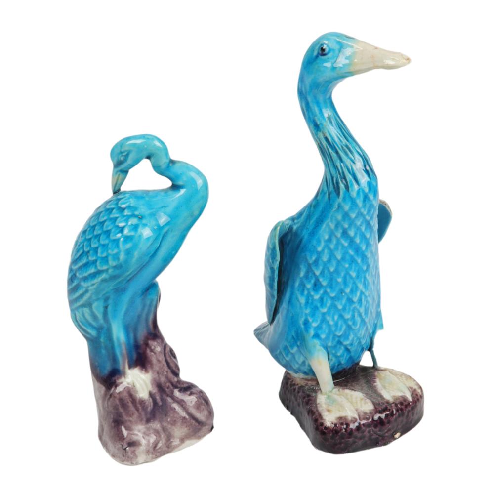 Appraisal: TWO CHINESE PEKING BLUE GLAZED PORCELAIN DUCK FIGURINES H X