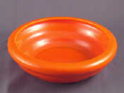 Appraisal: A Zsolnay orange glazed open bowl impressed mark Zsolnay cm