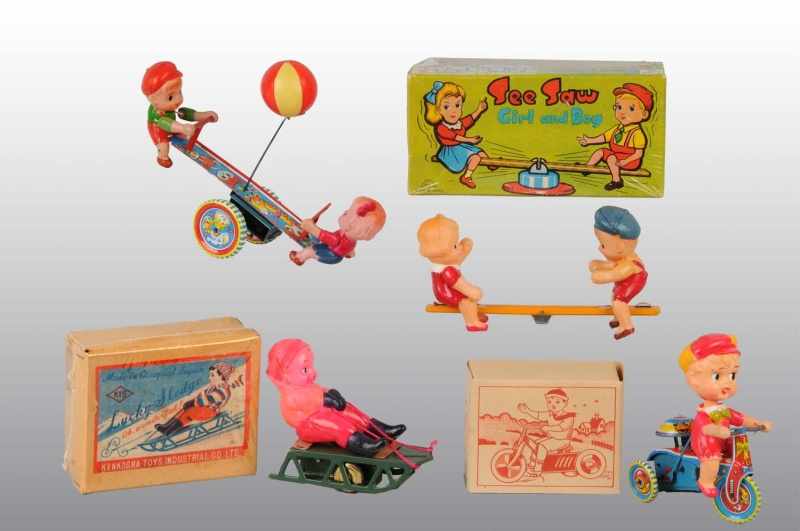 Appraisal: Lot of Celluloid Children Wind-Up Toys Description Japanese Working Includes