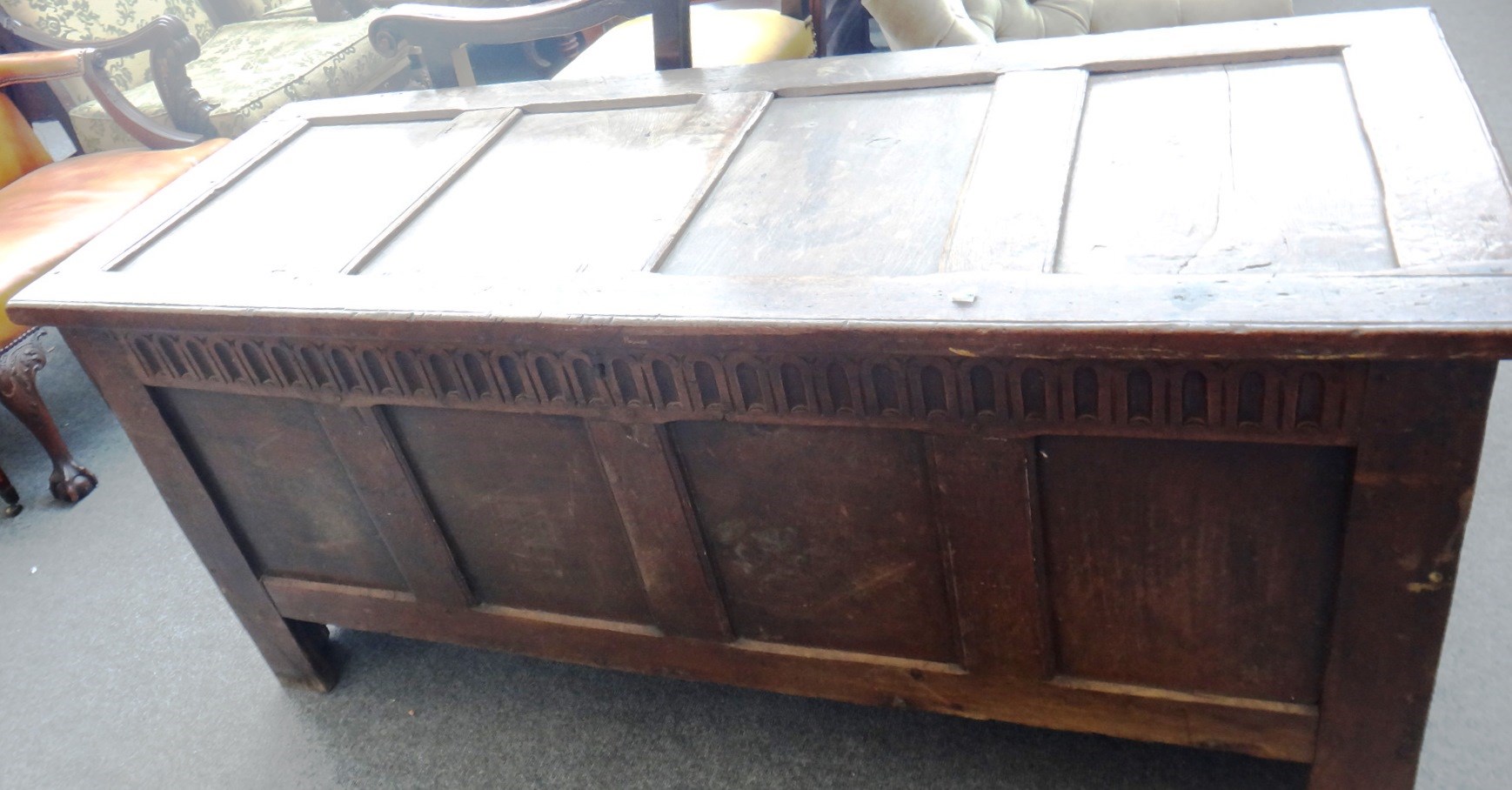 Appraisal: A late th century oak coffer with four panel lid