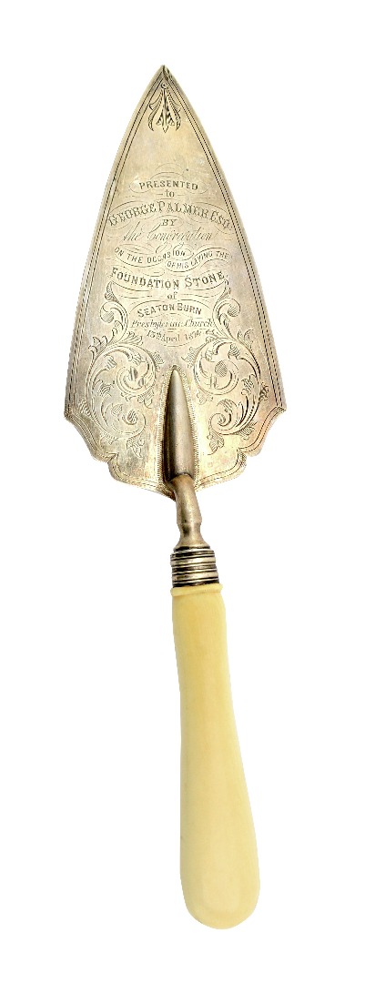 Appraisal: A Victorian silver presentation masonary trowel detailed Presented to George